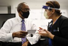 Keep Your COVID-19 Vaccine Card Safe But Don’t Laminate It. Here’s Why